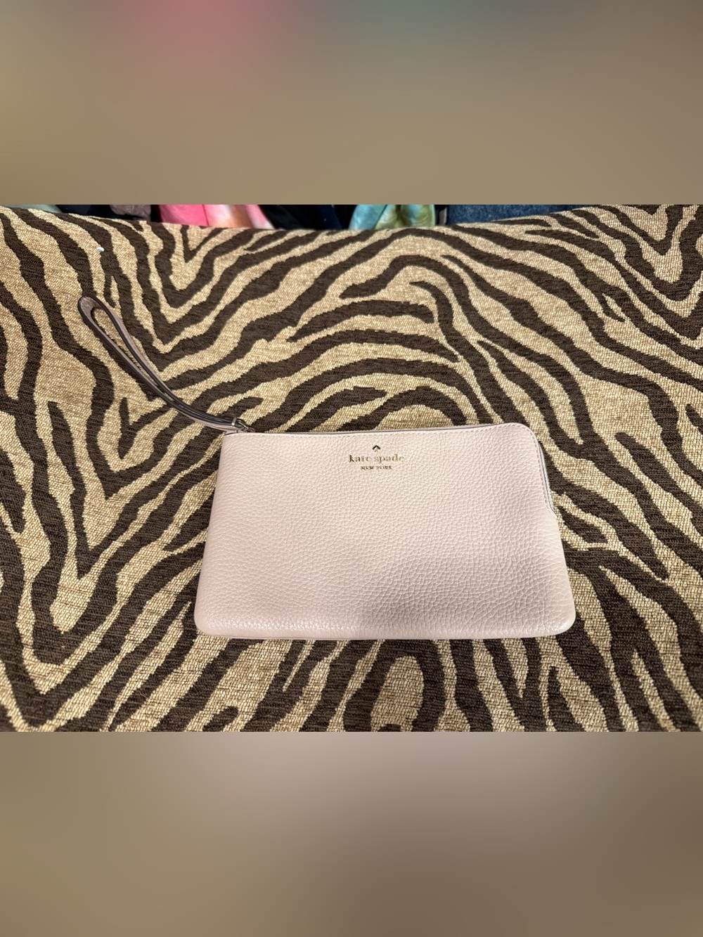 kate spade Pebbled Leather Wristlet in Pale Pink with Gold Logo